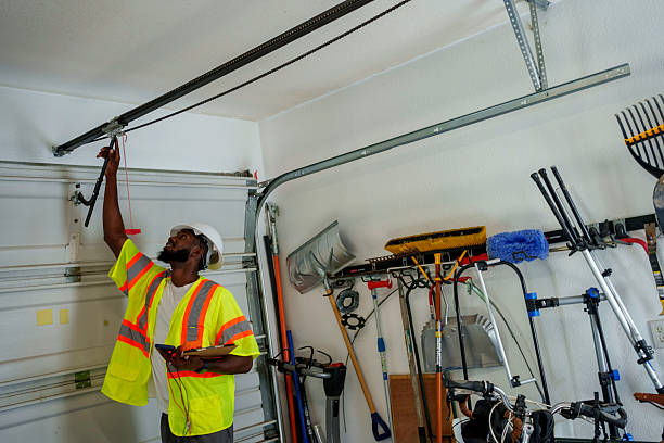Professional Garage Door Panel Replacement technician working in Chester, WV